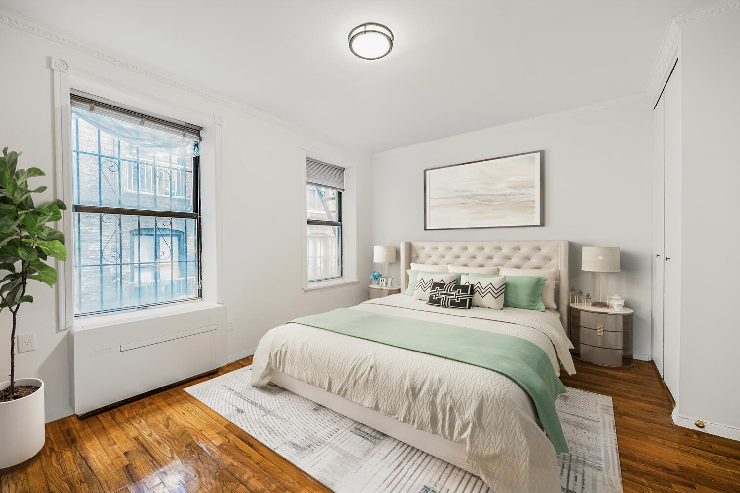 4 West 109th Street, Unit 4F Manhattan, NY 10025 - Photo 7 of 16 a bedroom with a bed and a window