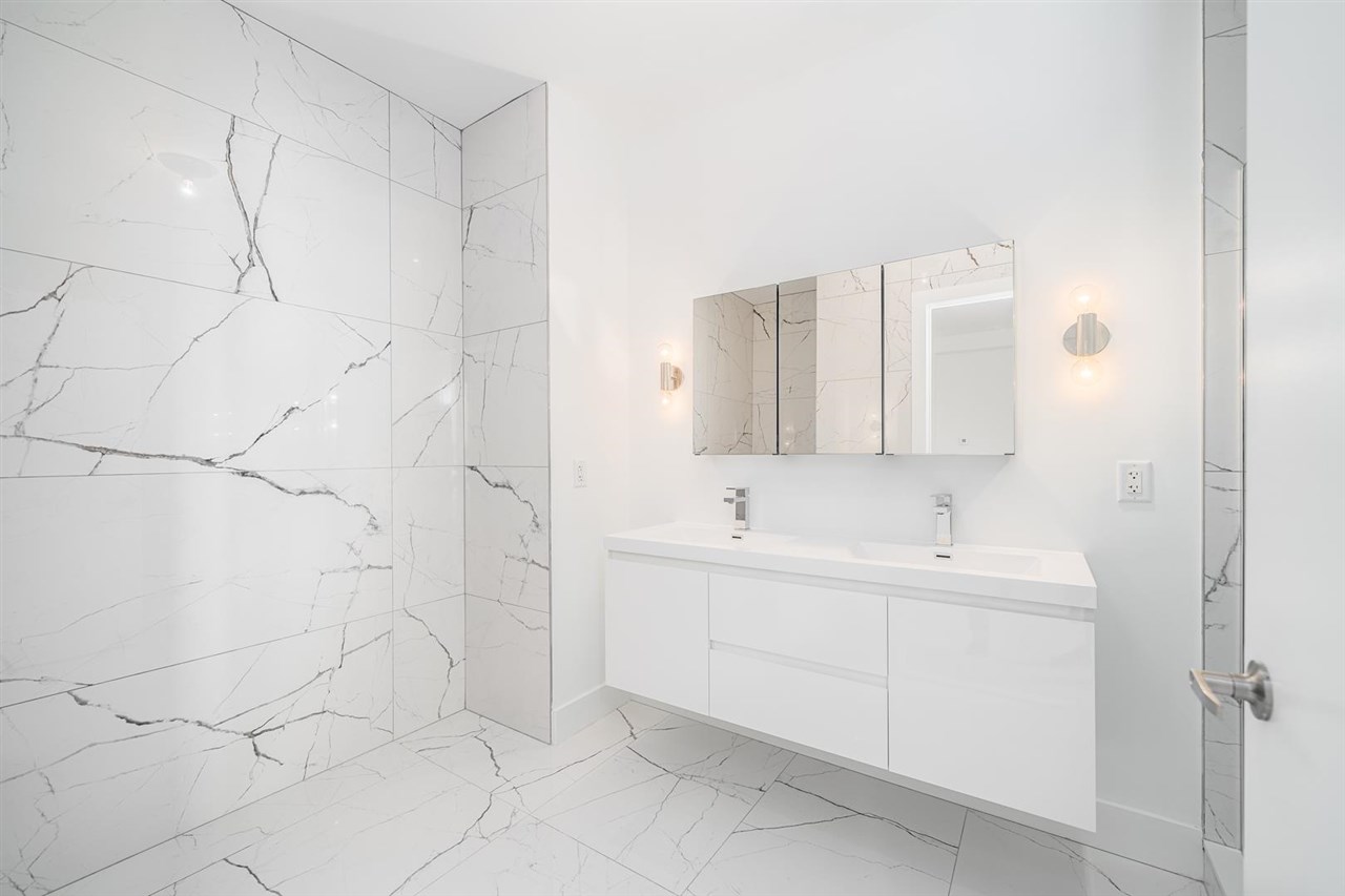 8621 River Road, Unit 6D North Bergen, NJ 07047 - Photo 18 of 36 a bathroom with a sink and mirror