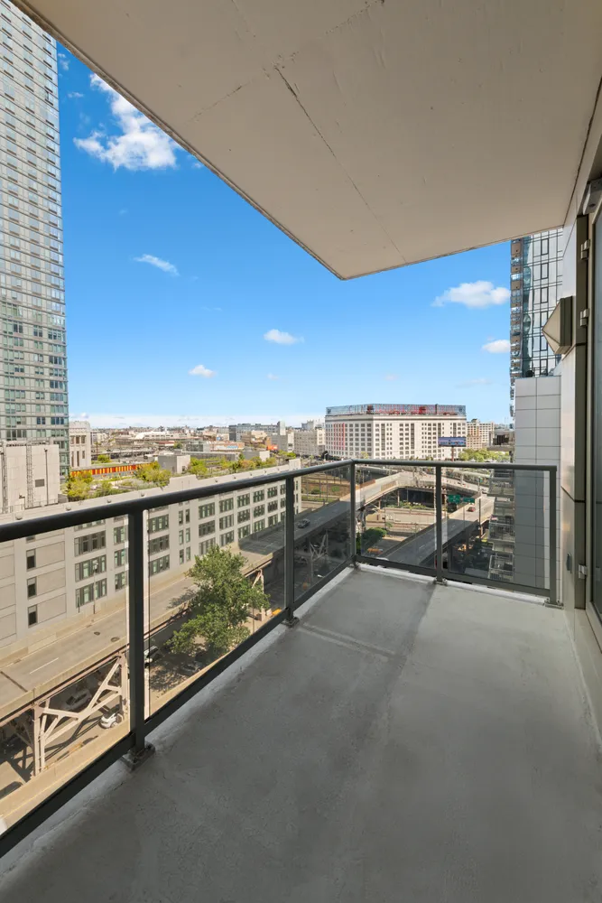 a view of a balcony with city view