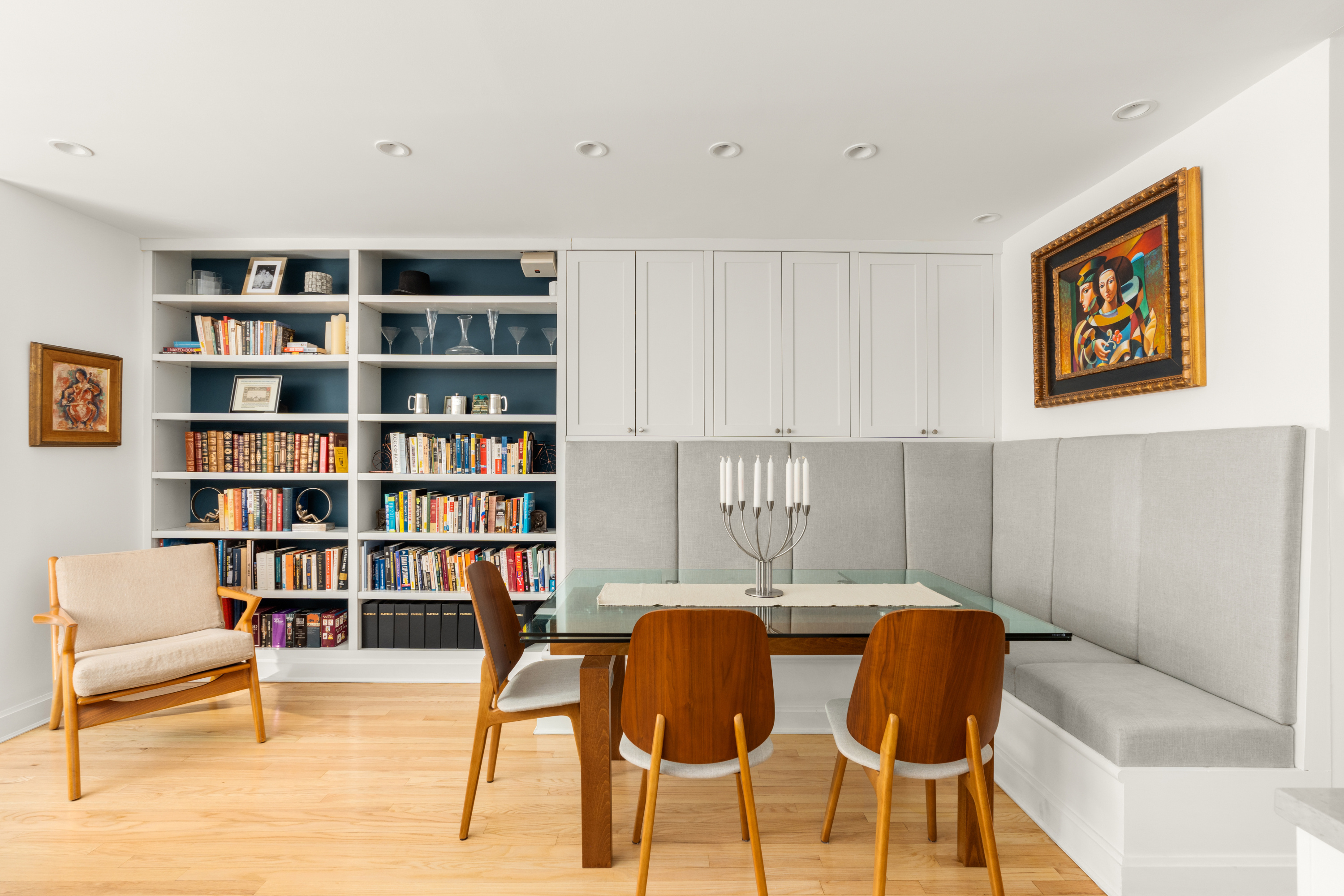 24 West 70th Street, Unit 1 Manhattan, NY 10023 - Photo 13 of 15 a workspace with a bookshelf