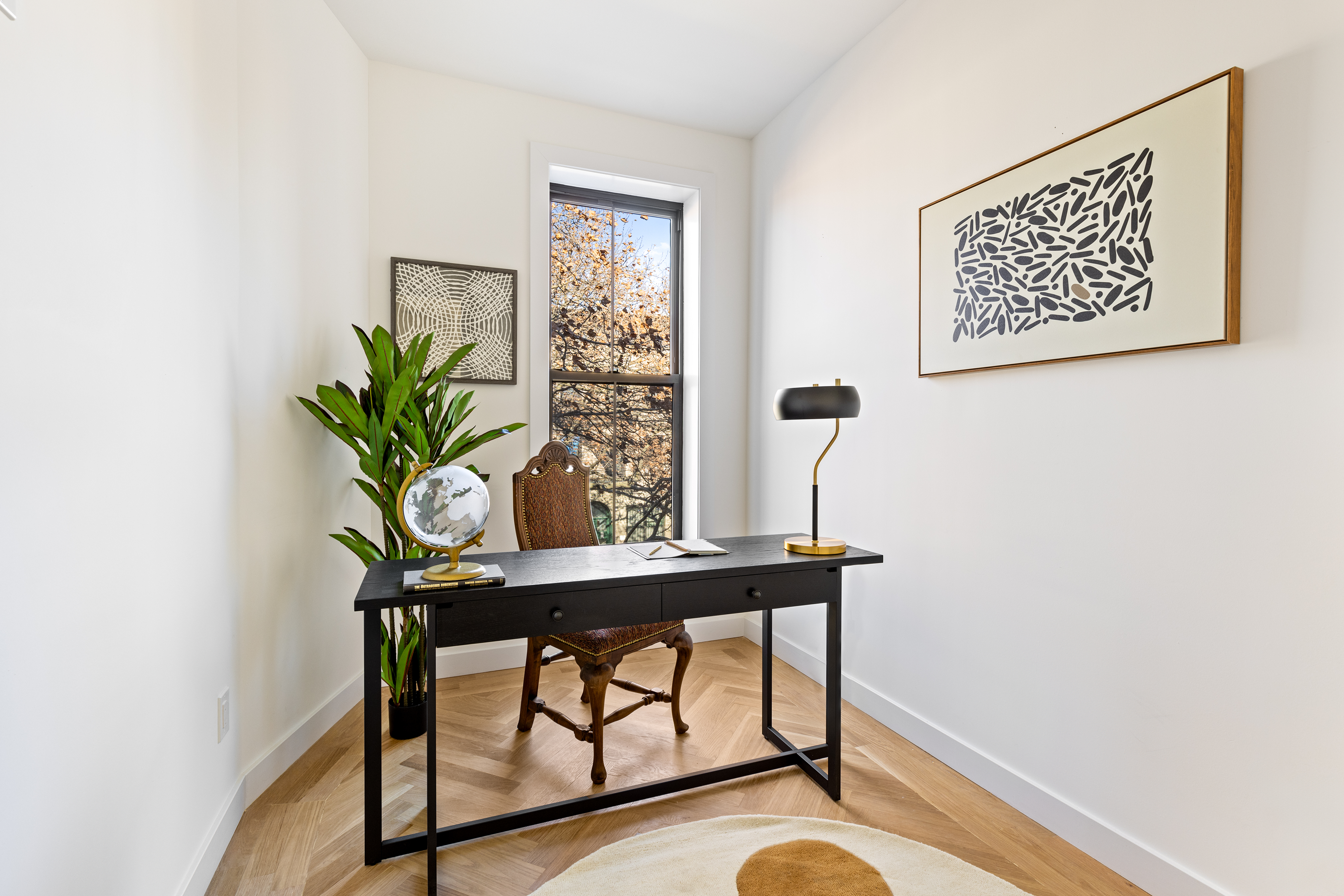 662 Decatur Street Brooklyn, NY 11233 - Photo 8 of 13 a view of a workspace with furniture