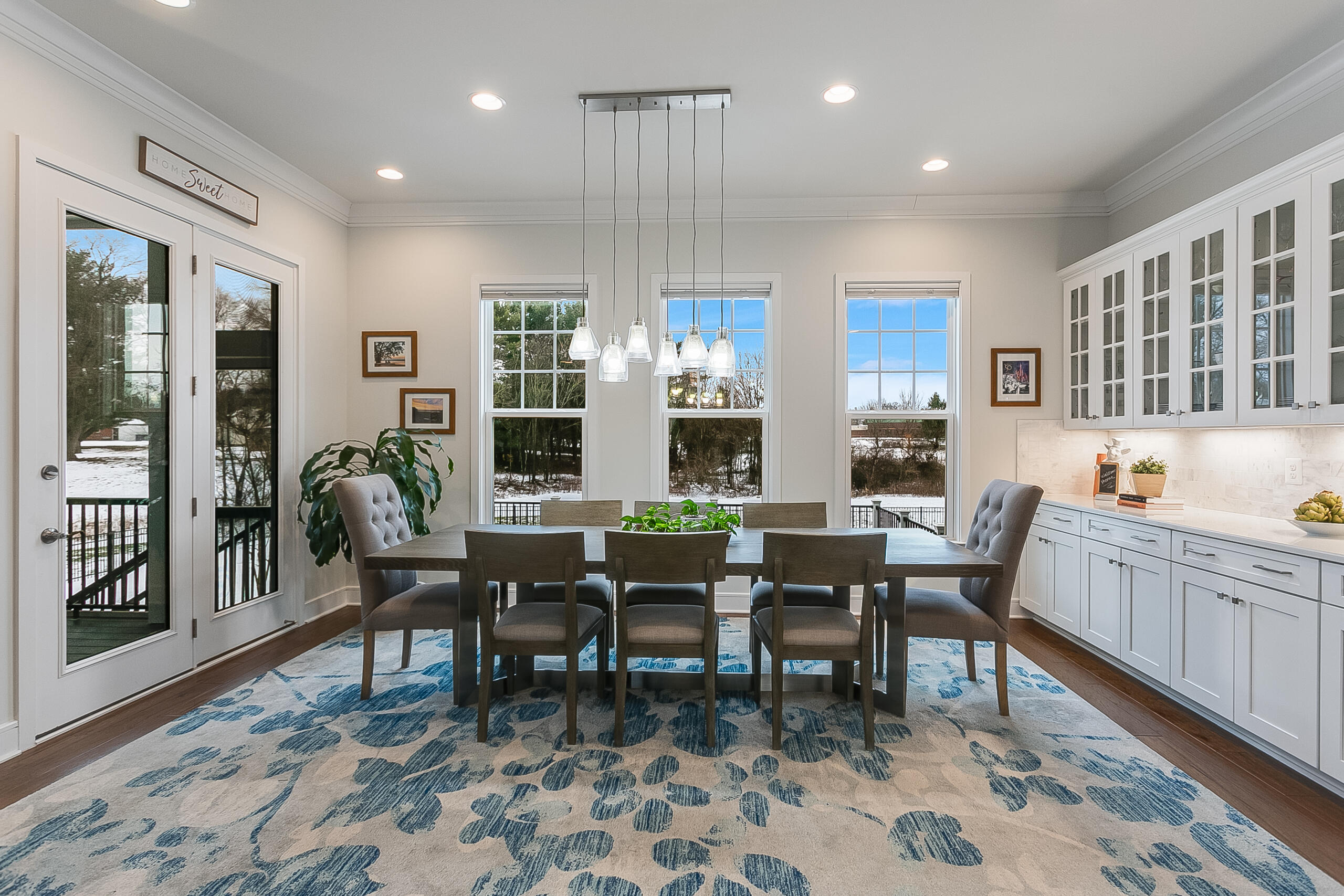 1011 Justinian Street Leesburg, VA 20175 - Photo 11 of 56 a dining room with wooden floor and a rug