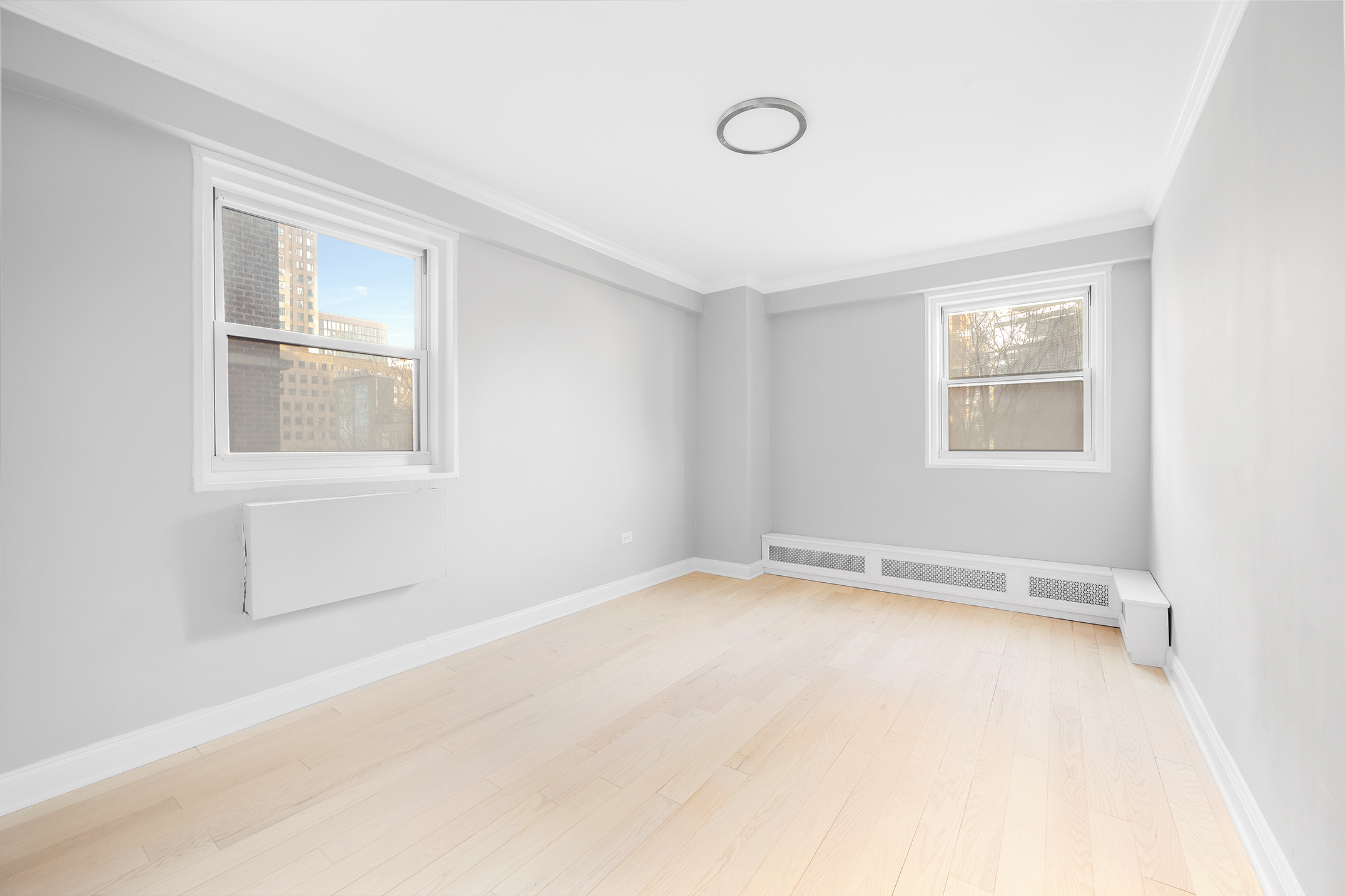 122 Ashland Place, Unit 12L Brooklyn, NY 11201 - Photo 6 of 16 an empty room with a window
