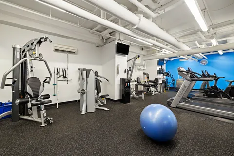 a view of a room with gym equipment