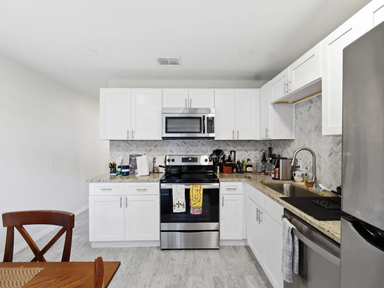 a kitchen with a stove and a sink