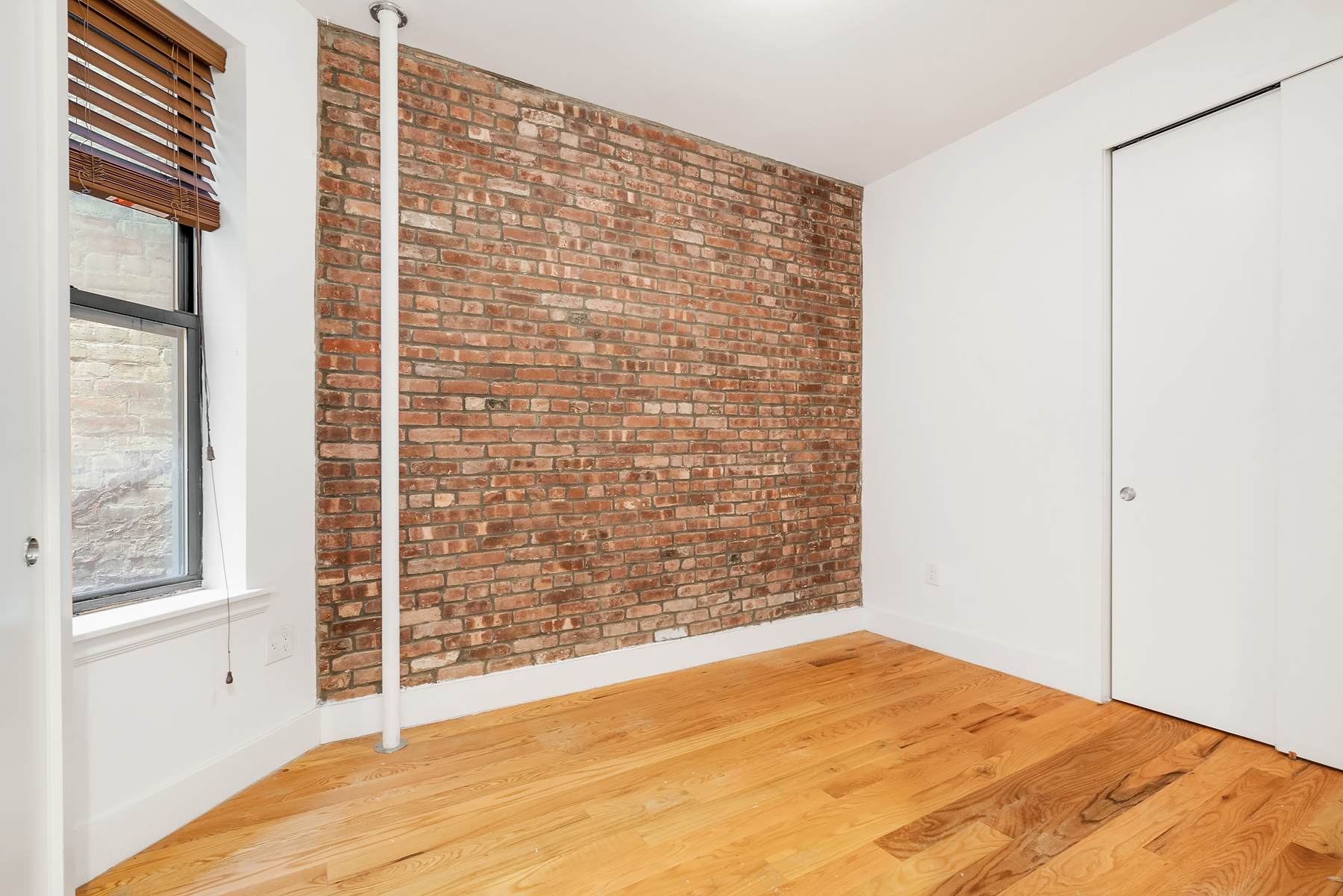 143 West 4th Street, Unit 2FE Manhattan, NY 10012 - Photo 2 of 4 a view of empty room with windows
