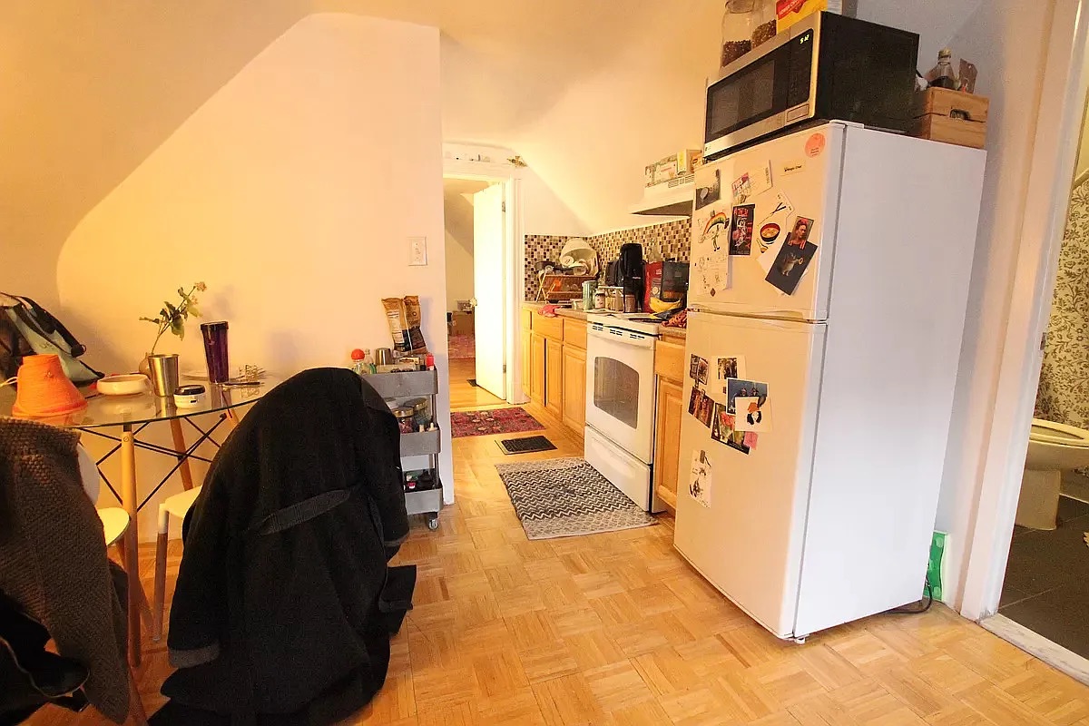 258 East 5th Street, Unit 4 Brooklyn, NY 11218 - Photo 5 of 5 a utility room with multiple dryer and washer