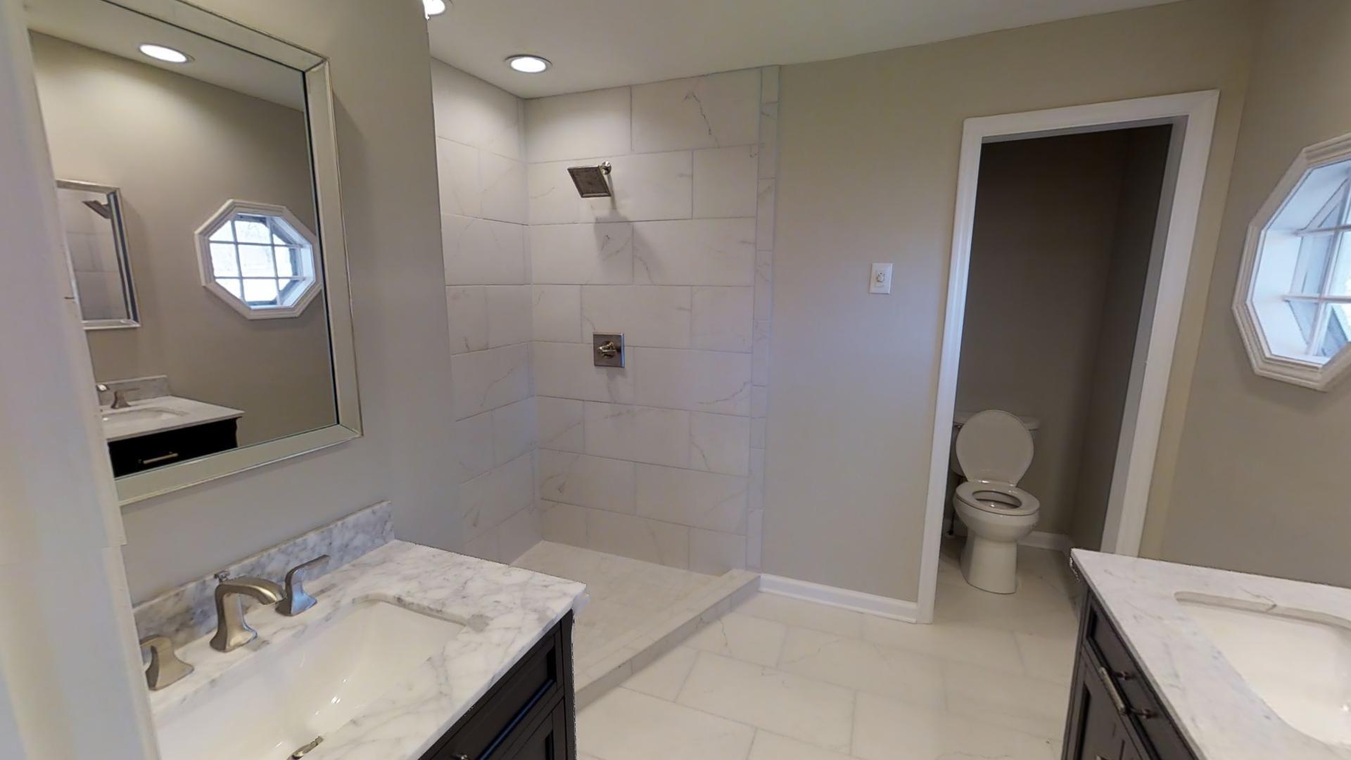 4425 Prescott Road Nashville, TN 37204 - Photo 12 of 26 a bathroom with a sink vanity granite and toilet