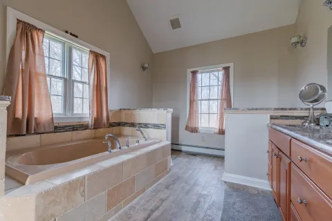 a view of a swimming pool with an outdoor seating