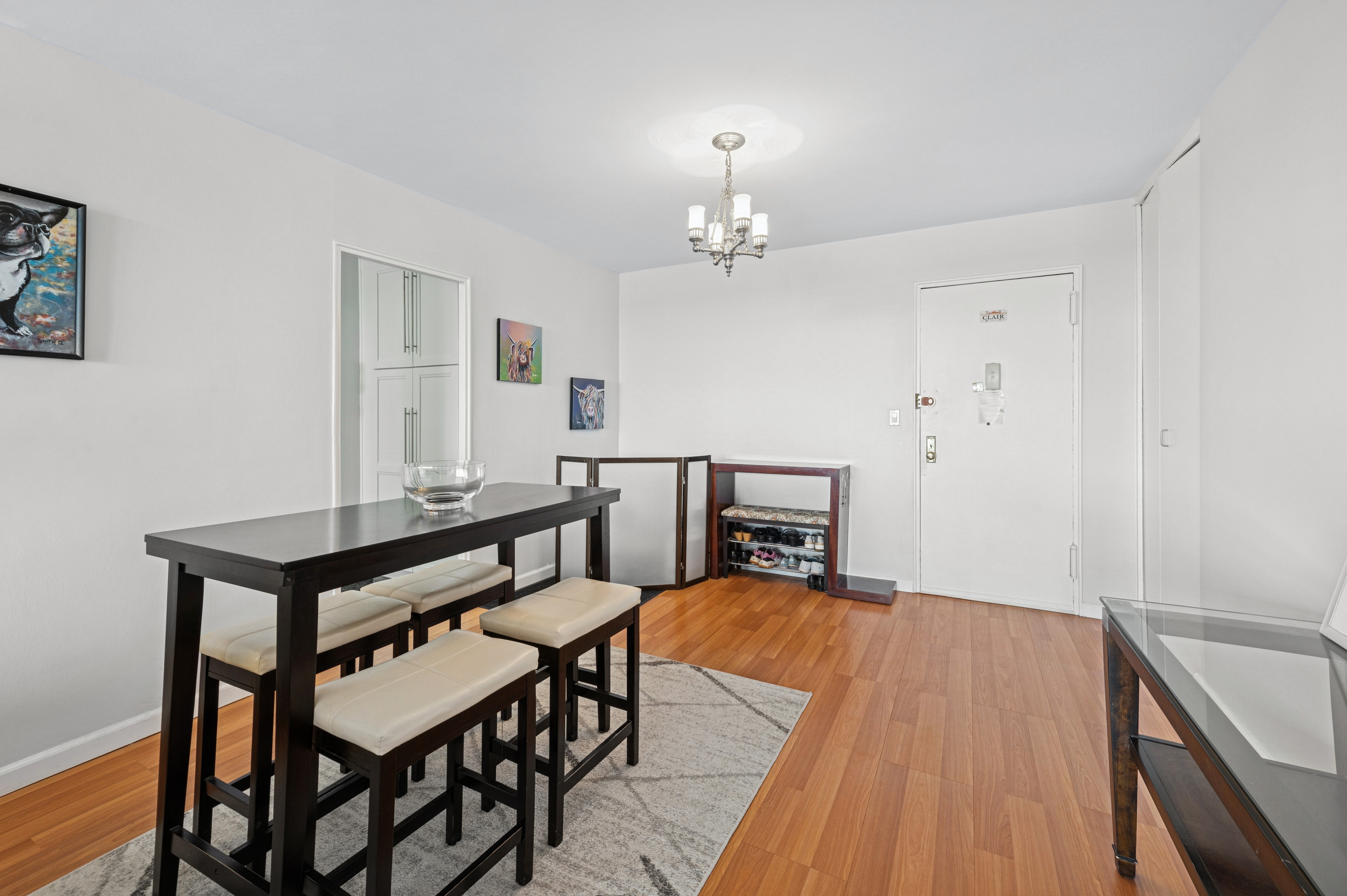 5700 Arlington Avenue, Unit 7G Bronx, NY 10471 - Photo 2 of 16 a view of a dining room with furniture and wooden floor