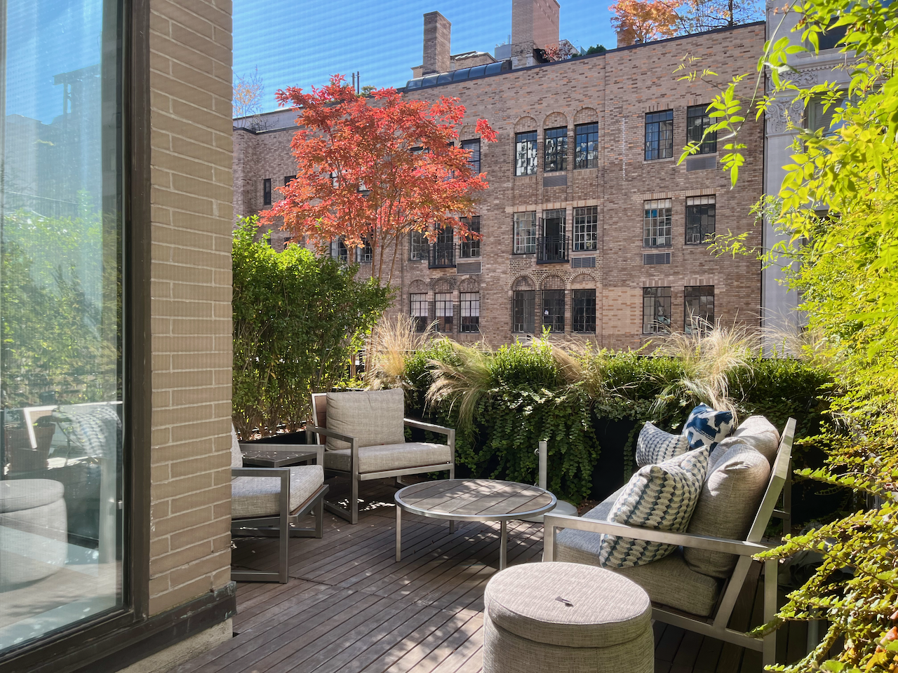 35 East 10th Street, Unit 4J Manhattan, NY 10003 - Photo 13 of 19 a view of a patio with couches table and chairs and potted plants