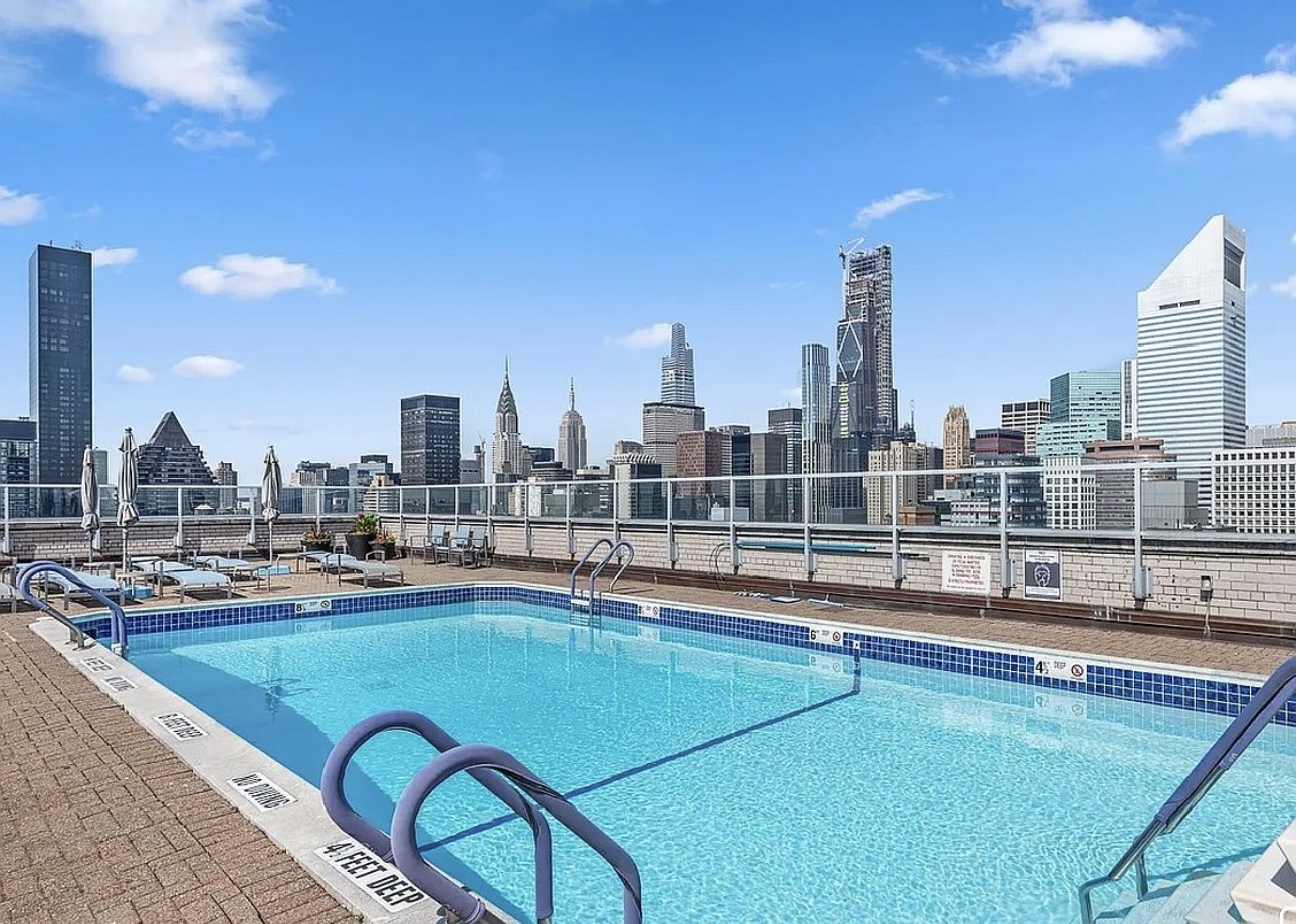 400 East 56th Street, Unit 38S Manhattan, NY 10022 - Photo 15 of 16 a view of a city with tall buildings