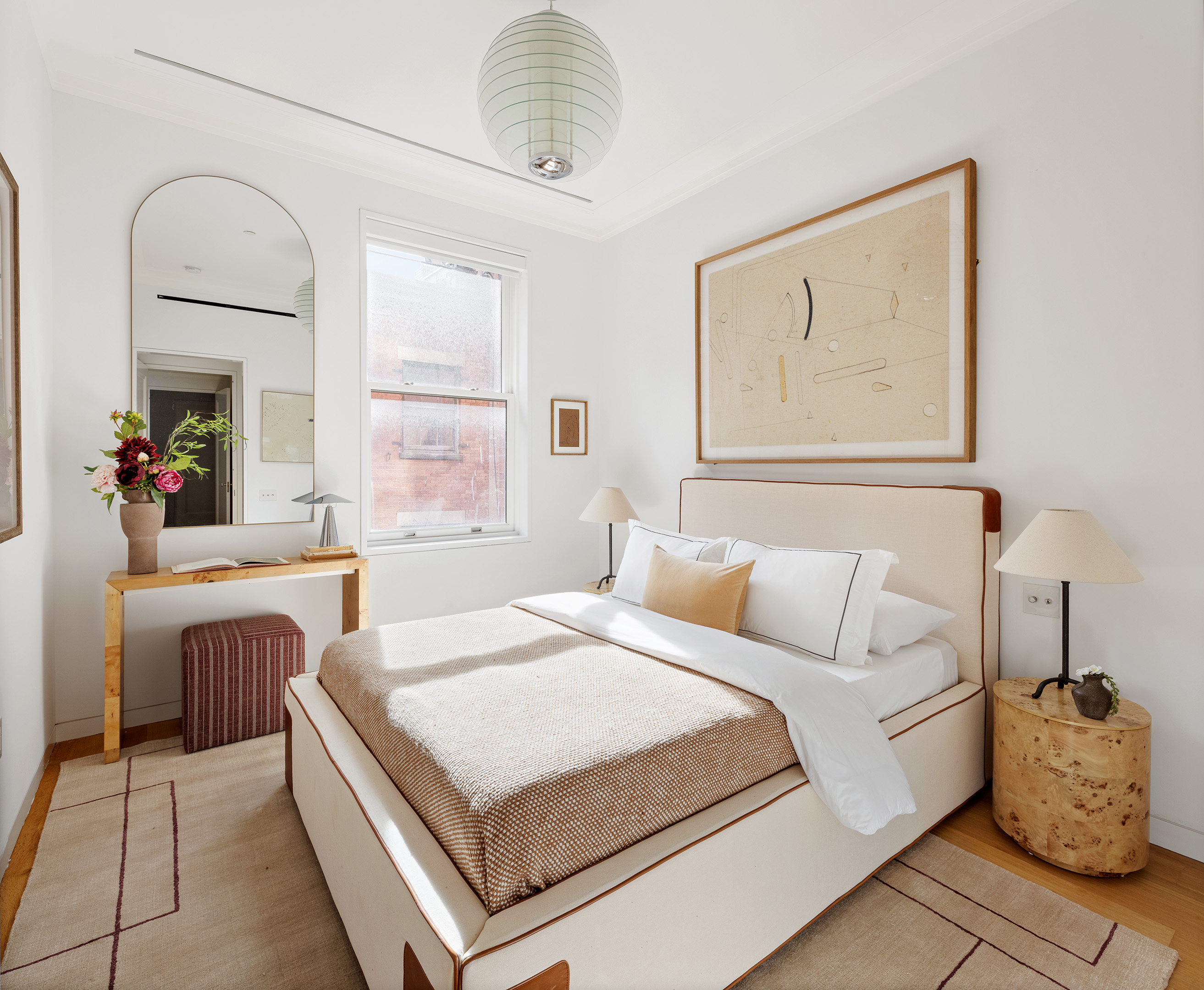 7 Harrison Street, Unit 5S Manhattan, NY 10013 - Photo 16 of 21 a bedroom with a bed and a chandelier