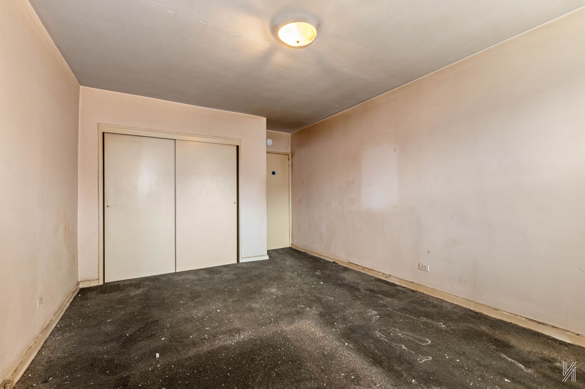 33-05 90th Street, Unit 4F Queens, NY 11372 - Photo 10 of 18 an empty room with closet area