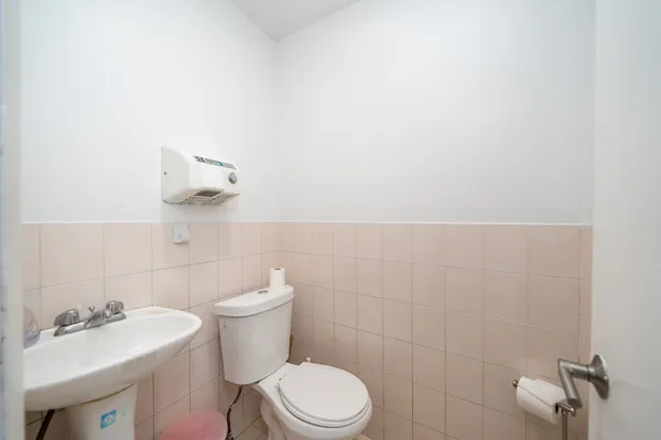 a bathroom with a sink and a toilet