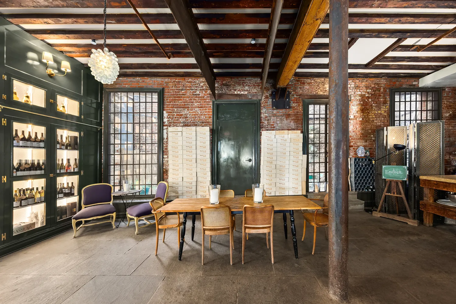 a view of a livingroom with furniture and windows