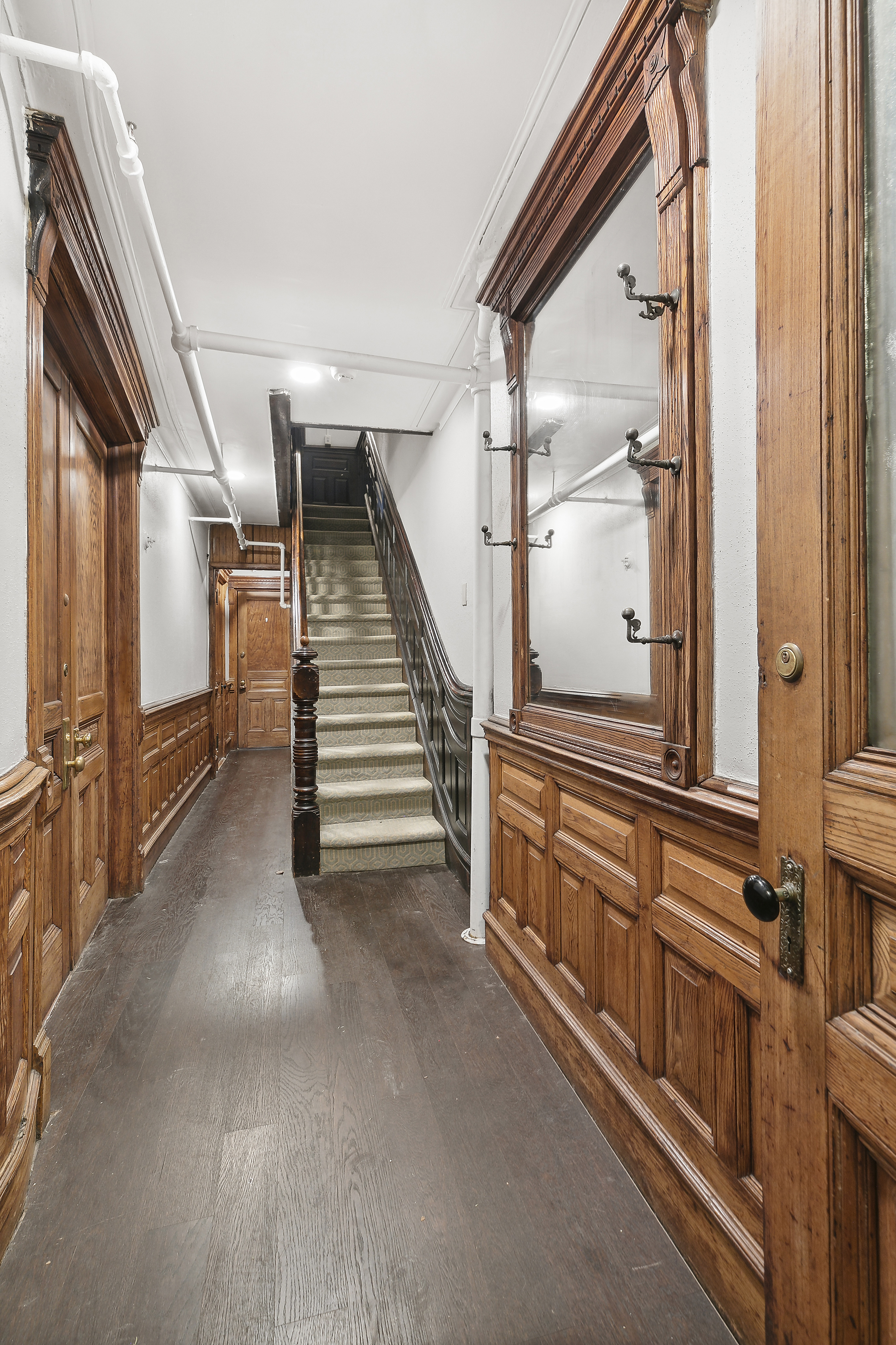 7 West 122nd Street Manhattan, NY 10027 - Photo 16 of 23 a view of an entryway with staircase