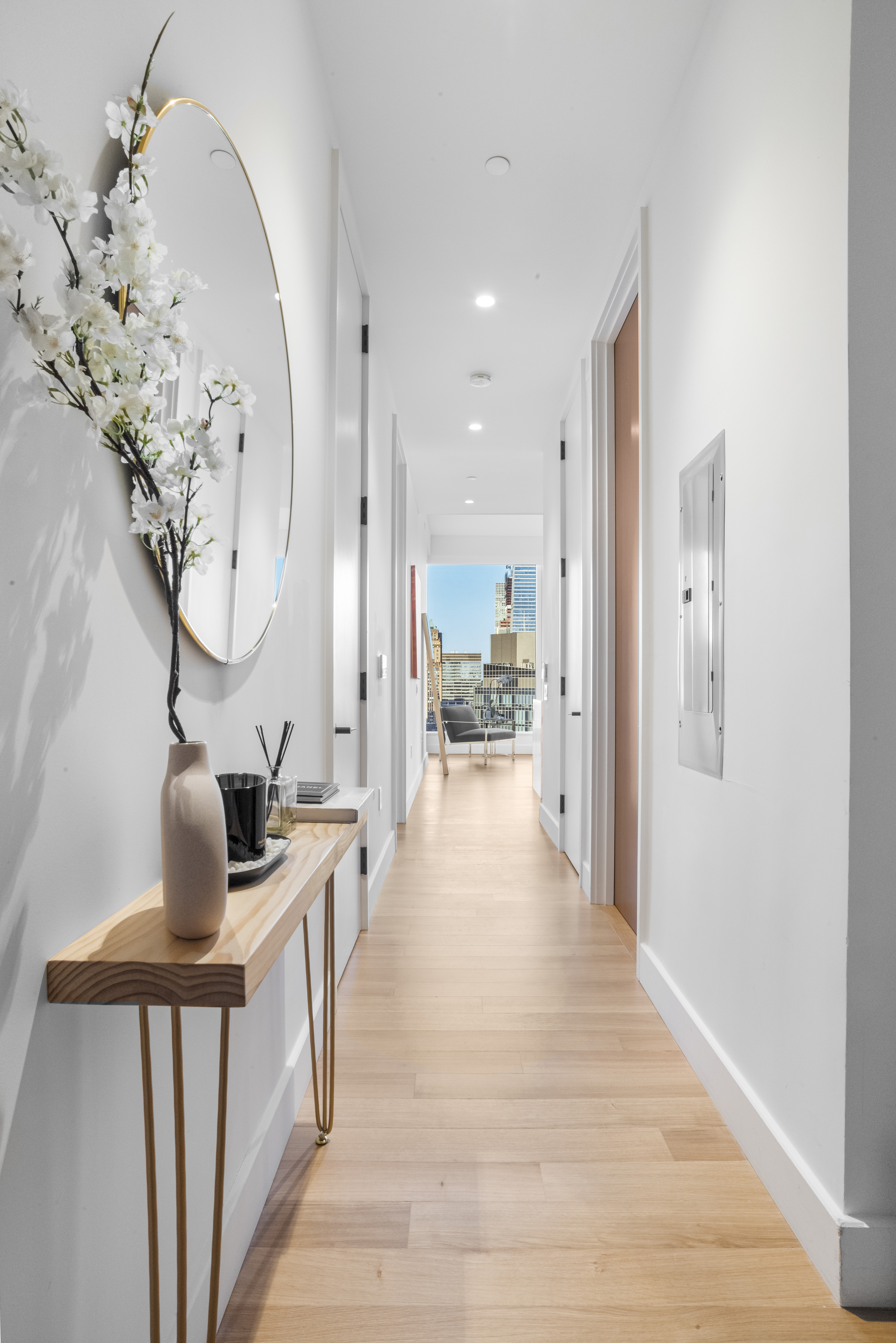 15 East 30th Street, Unit Undisclosed Manhattan, NY 10016 - Photo 2 of 23 a view of a living room and a dining room with wooden floor