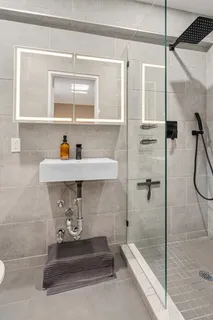 a bathroom with a sink and a bathtub