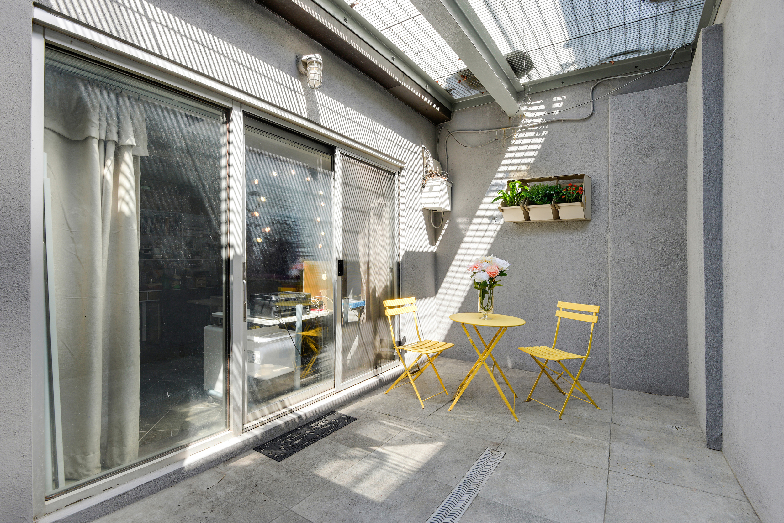 335 Warren Street, Unit 102 Brooklyn, NY 11201 - Photo 13 of 20 a view of an outdoor space with porch