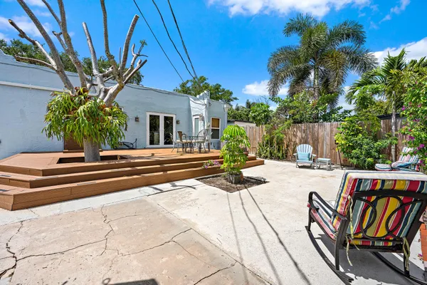 a view of a backyard with a patio