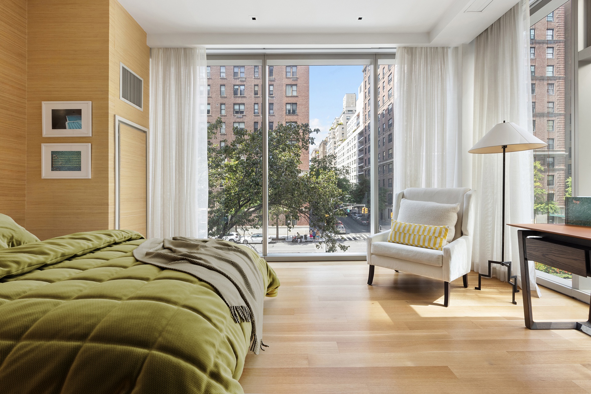 1055 Park Avenue, Unit 1 Manhattan, NY 10028 - Photo 11 of 19 a bed sitting in a bedroom next to a window