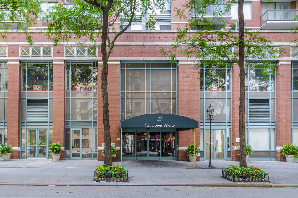 22 West 15th Street, Unit 19D Manhattan, NY 10011 - Photo 17 of 18 a front view of a building with street