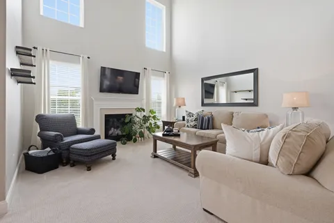 a living room with furniture or fireplace and a flat screen tv