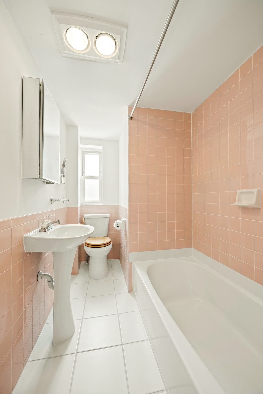 726A Union Street, Unit 1 Brooklyn, NY 11215 - Photo 8 of 13 a bathroom with a sink a toilet and mirror
