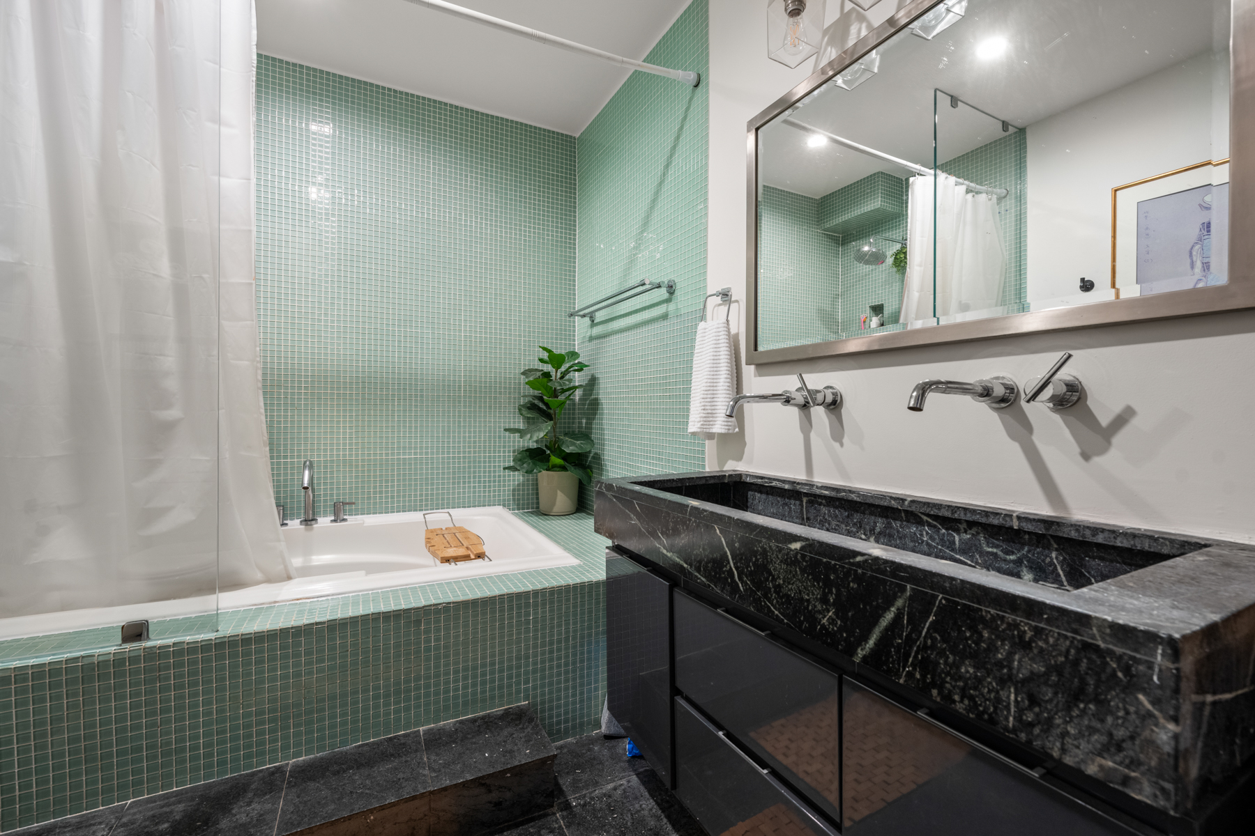 484 Massachusetts Avenue, Unit 1 Boston, MA 02118 - Photo 10 of 20 a bathroom with a sink and a mirror