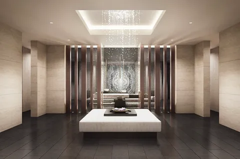 a living room with furniture and large windows