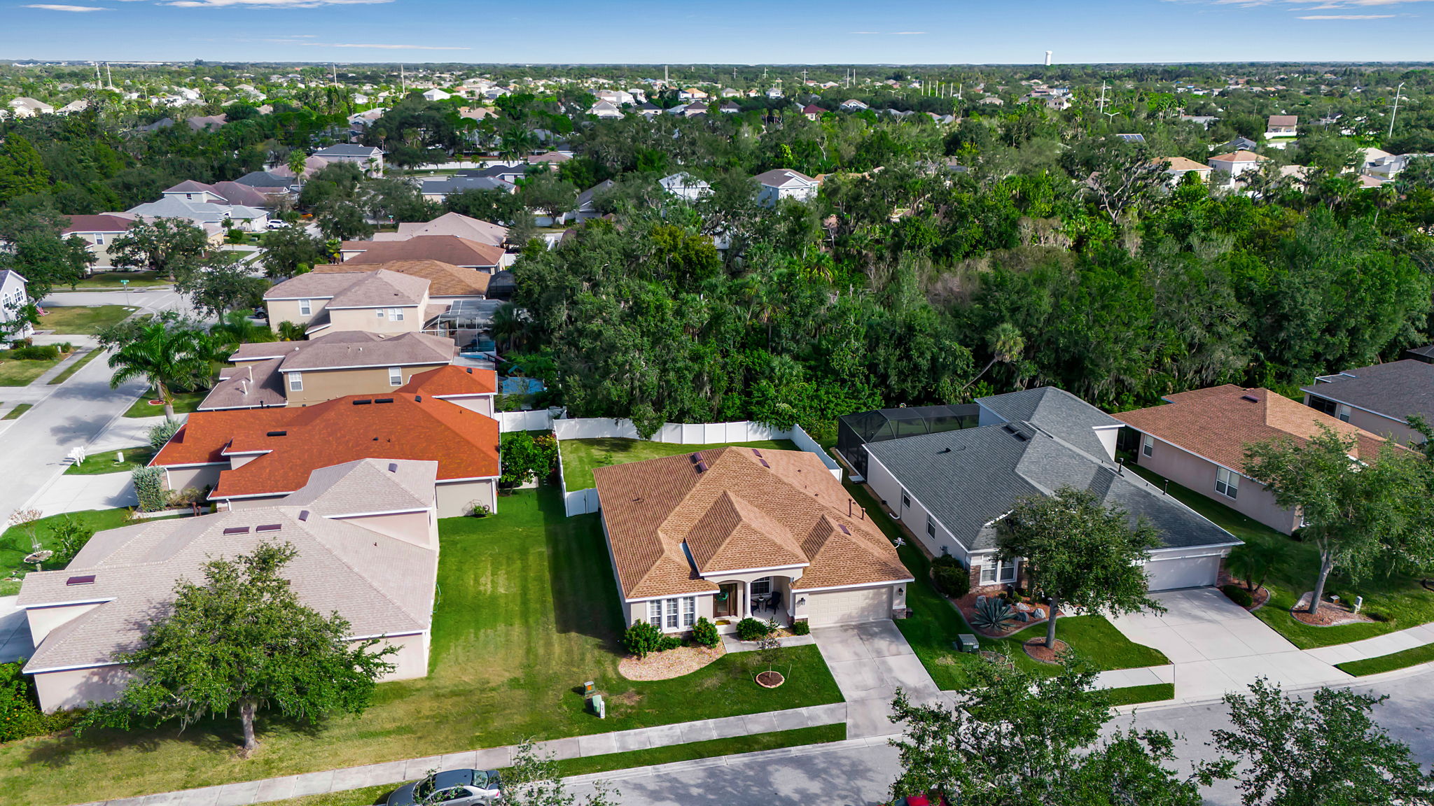 6106 34th Court East Bradenton, FL 34203 - Photo 7 of 69 an aerial view of residential houses with outdoor space and trees