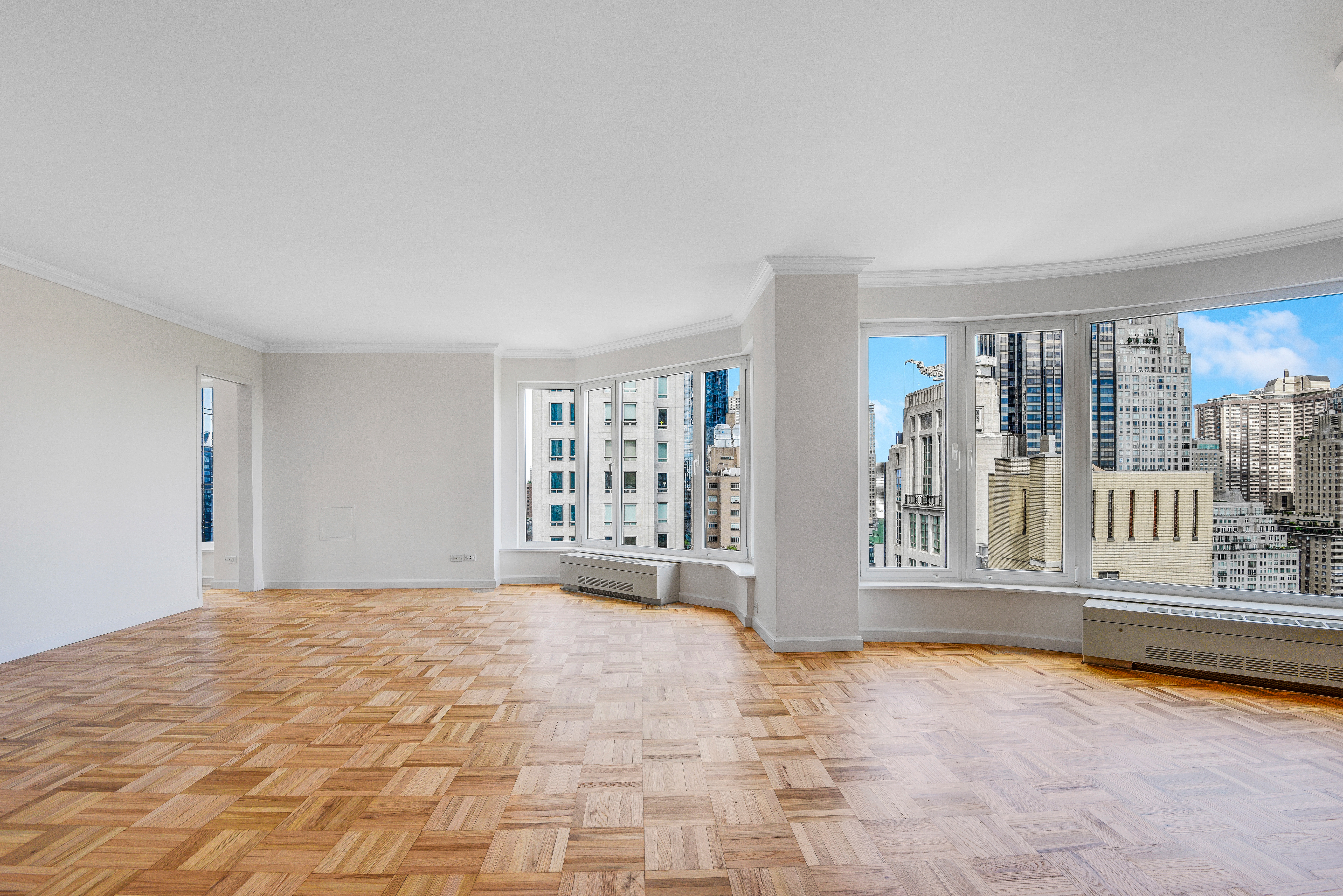 200 Central Park South, Unit 29C Manhattan, NY 10019 - Photo 9 of 23 a view of an empty room with a window