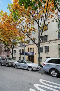 a car parked in front of a house