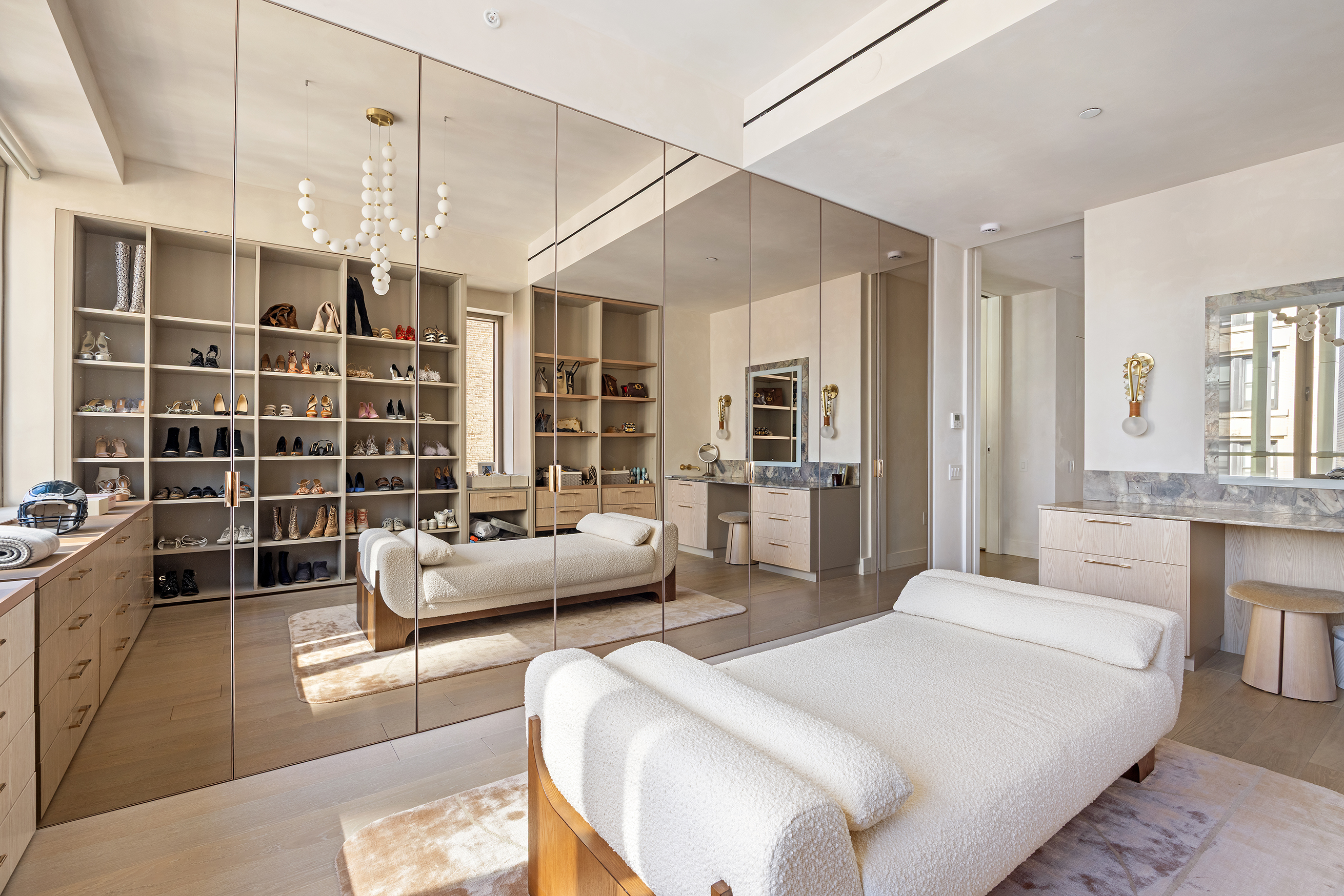 1 Great Jones Alley, Unit 10 Manhattan, NY 10012 - Photo 17 of 41 a large bedroom with a large bed and windows