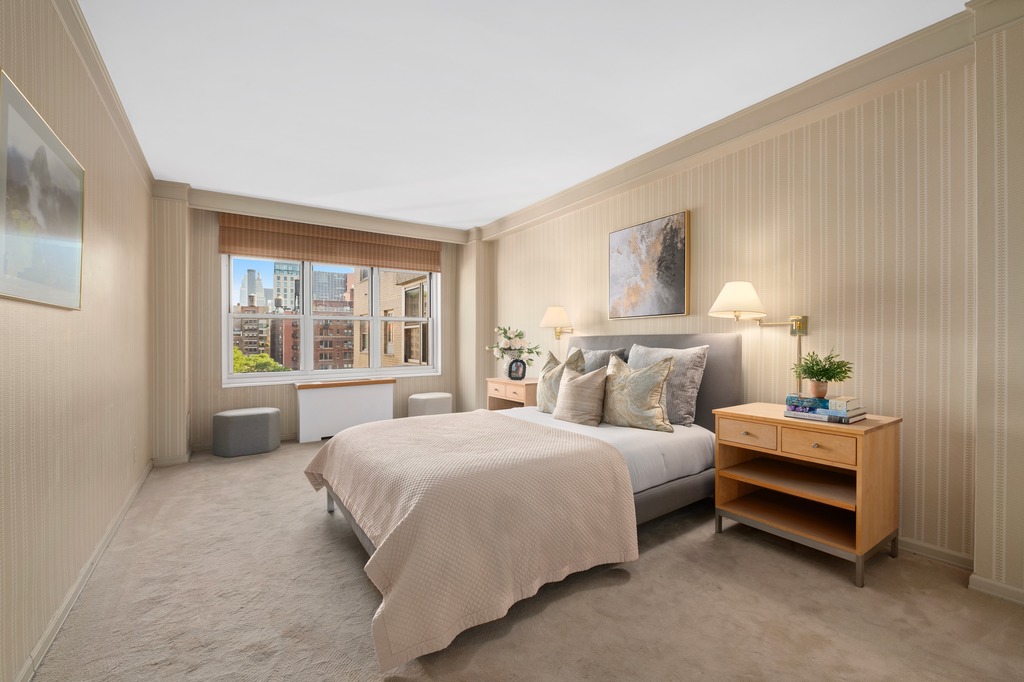 20 East 9th Street, Unit 12X Manhattan, NY 10003 - Photo 11 of 26 a bedroom with bed and a window