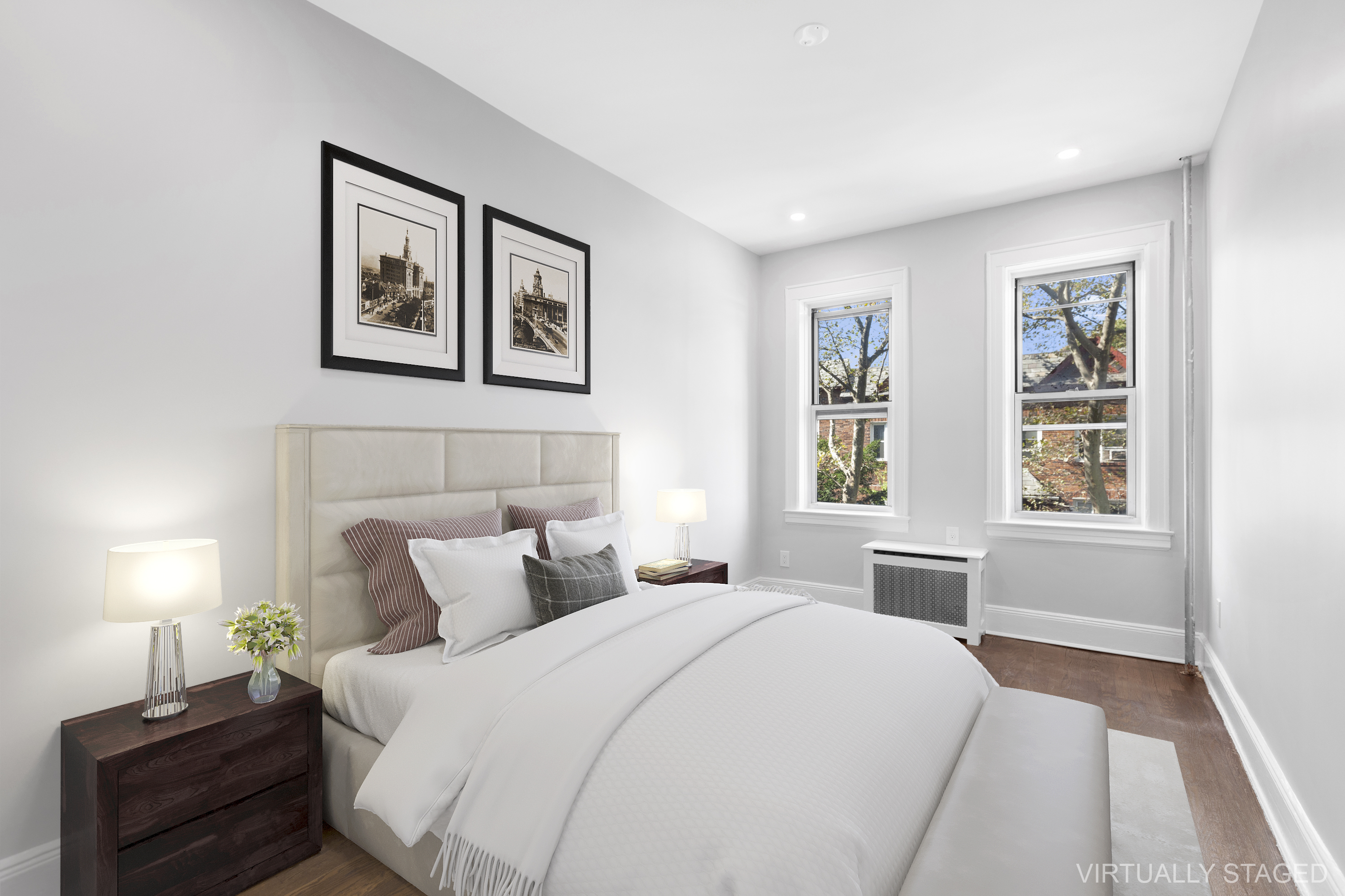 45-15 41st Street, Unit 3R Queens, NY 11104 - Photo 5 of 7 a bedroom with a bed and a window