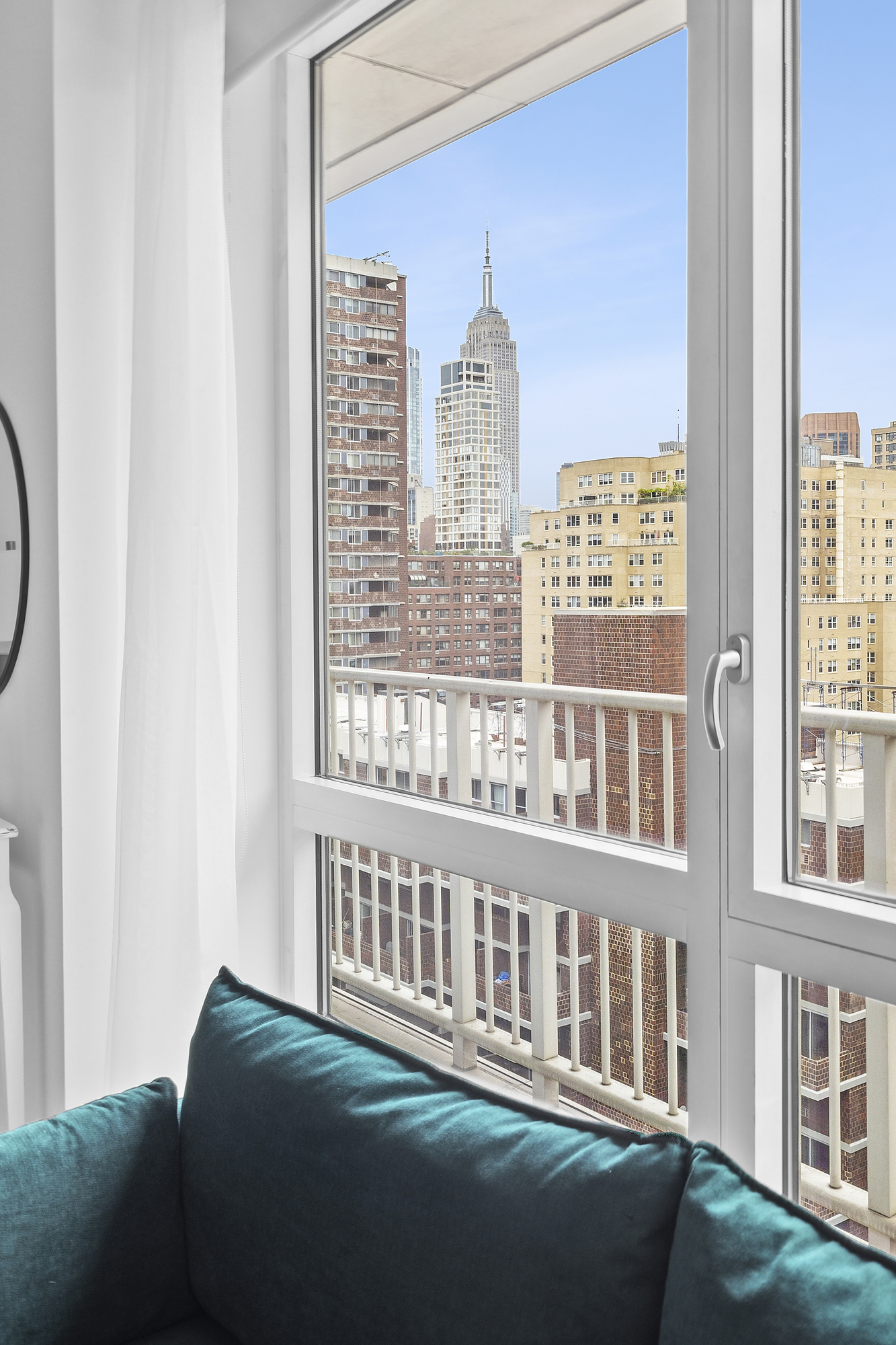 340 East 23rd Street, Unit 15G Manhattan, NY 10010 - Photo 2 of 9 a balcony view with a window