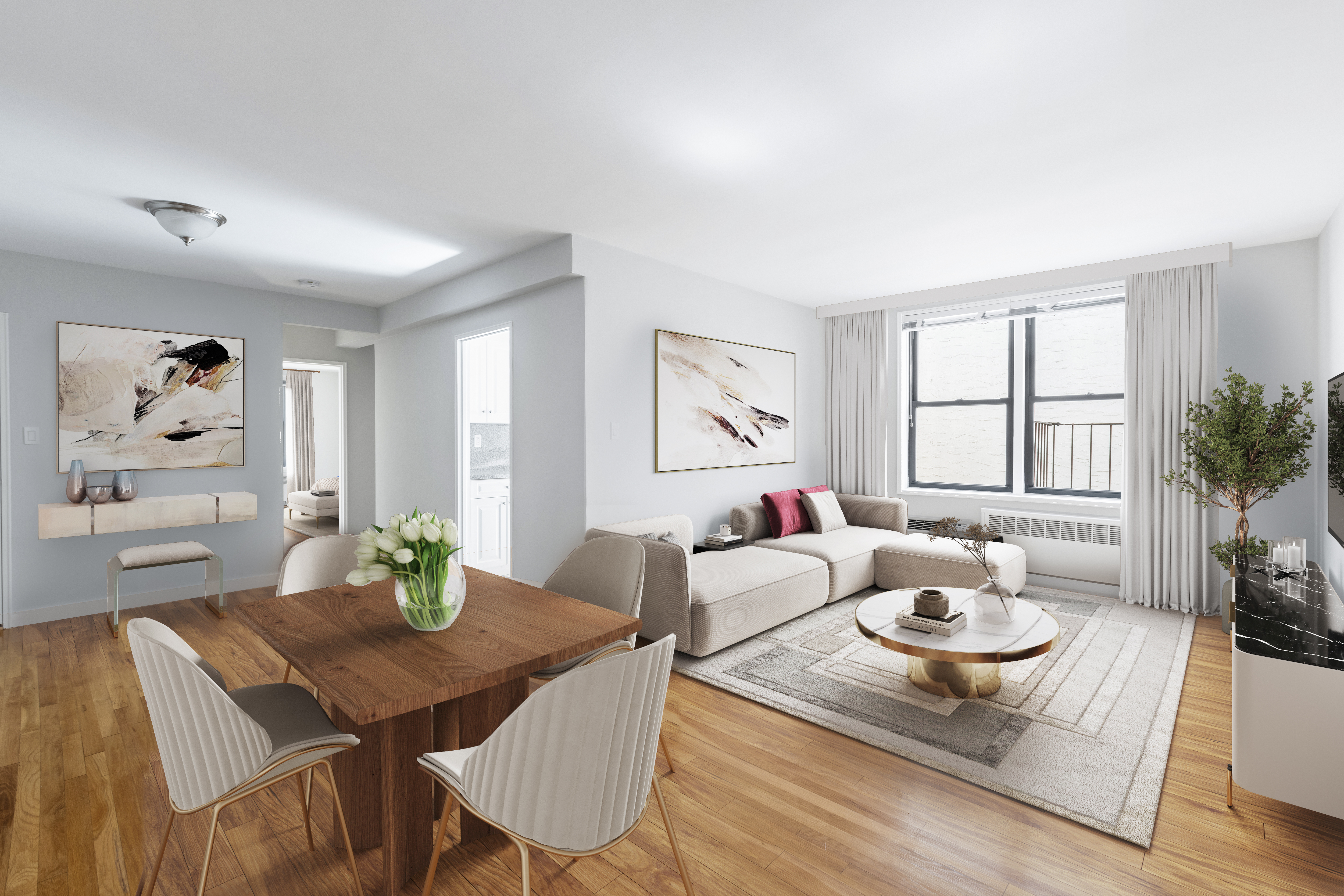 a living room with furniture and wooden floor