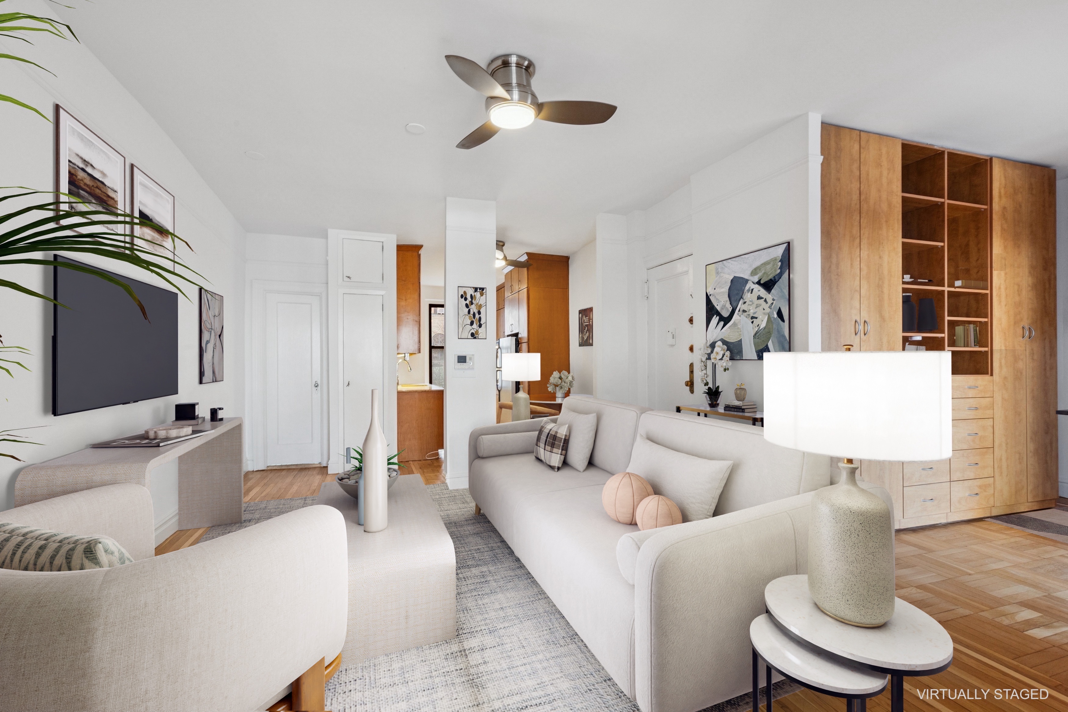 115 Cabrini Boulevard, Unit B51 Manhattan, NY 10033 - Photo 4 of 23 a living room with furniture and a flat screen tv