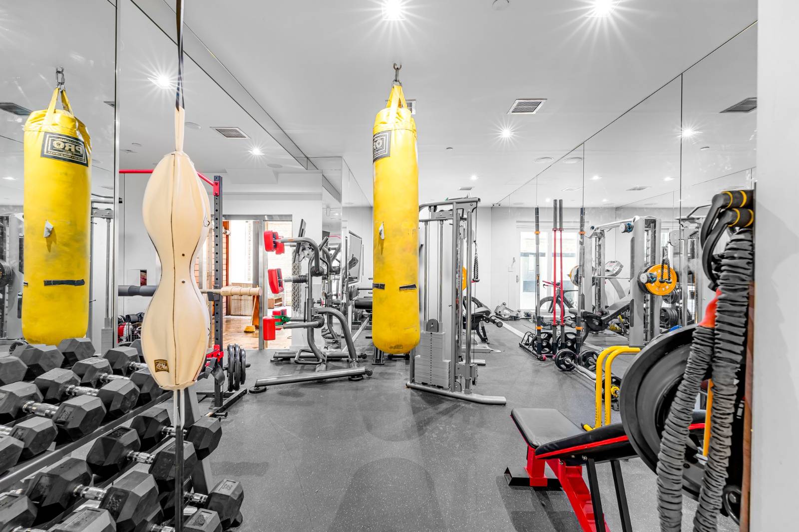 124 East 13th Street, Unit 3 Manhattan, NY 10003 - Photo 22 of 26 a view of a room with gym equipment