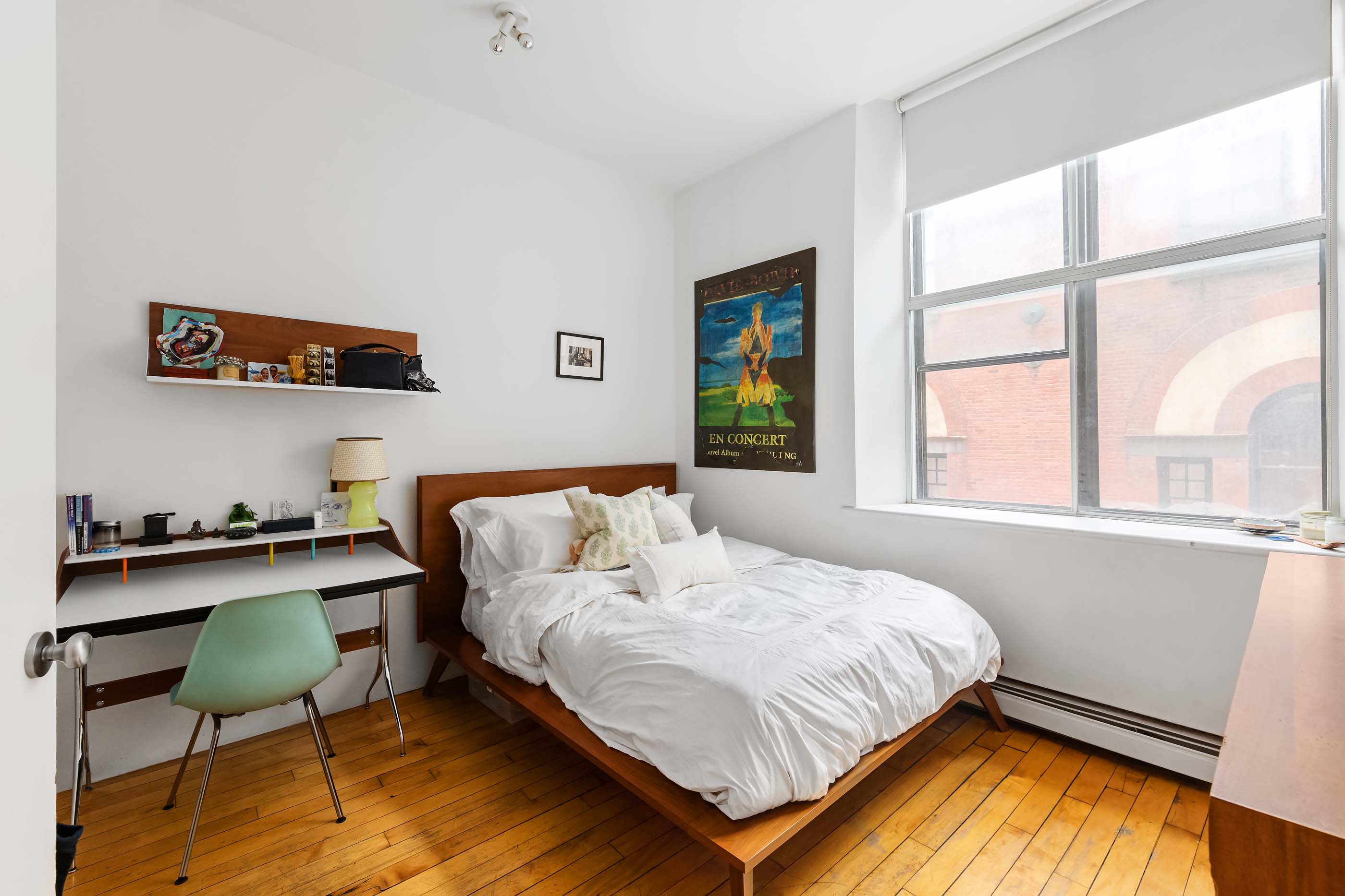 57 Laight Street, Unit 3 Manhattan, NY 10013 - Photo 10 of 15 a bedroom with a bed and a window