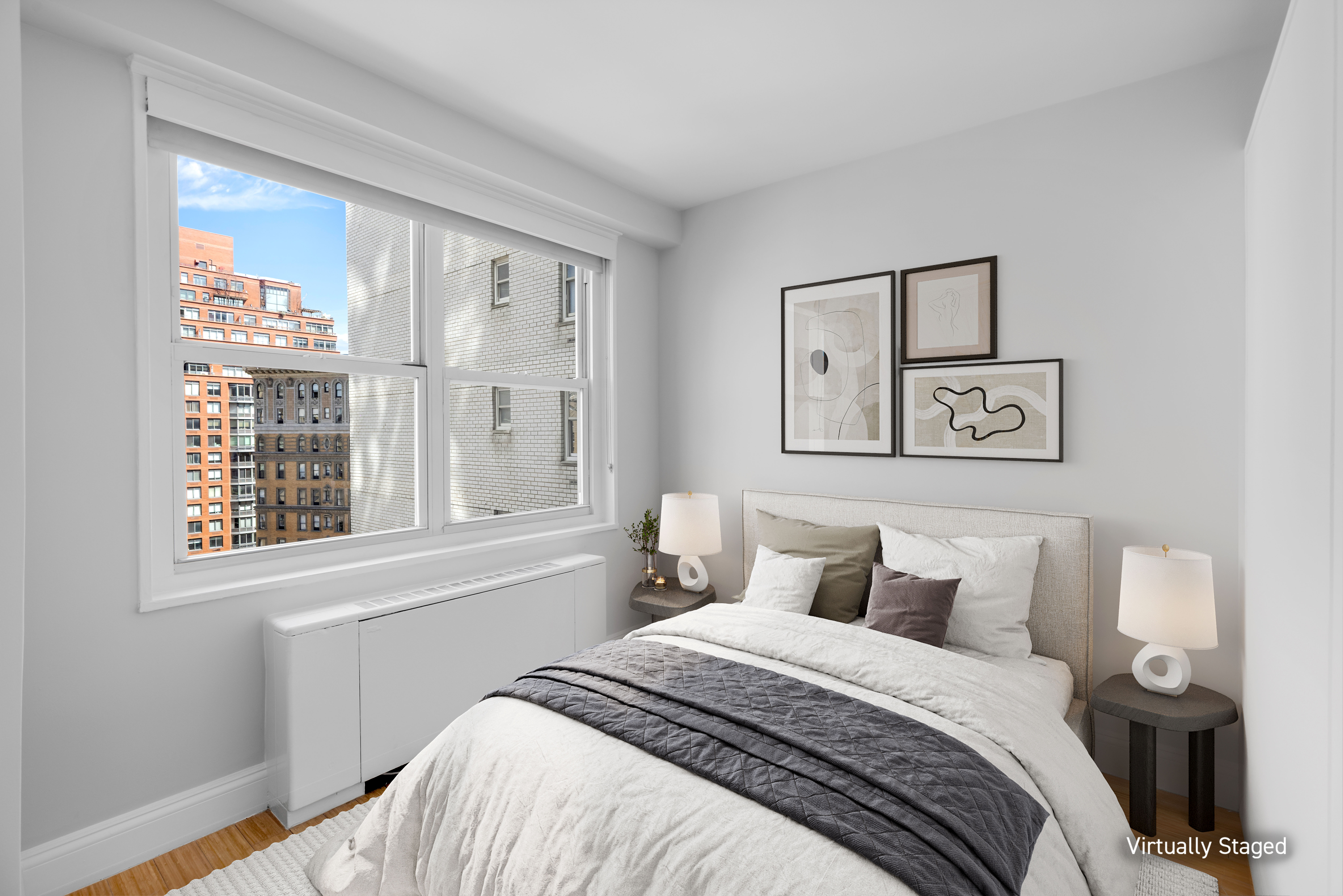 155 West 68th Street, Unit 1518 Manhattan, NY 10023 - Photo 4 of 10 a bedroom with a bed and a window
