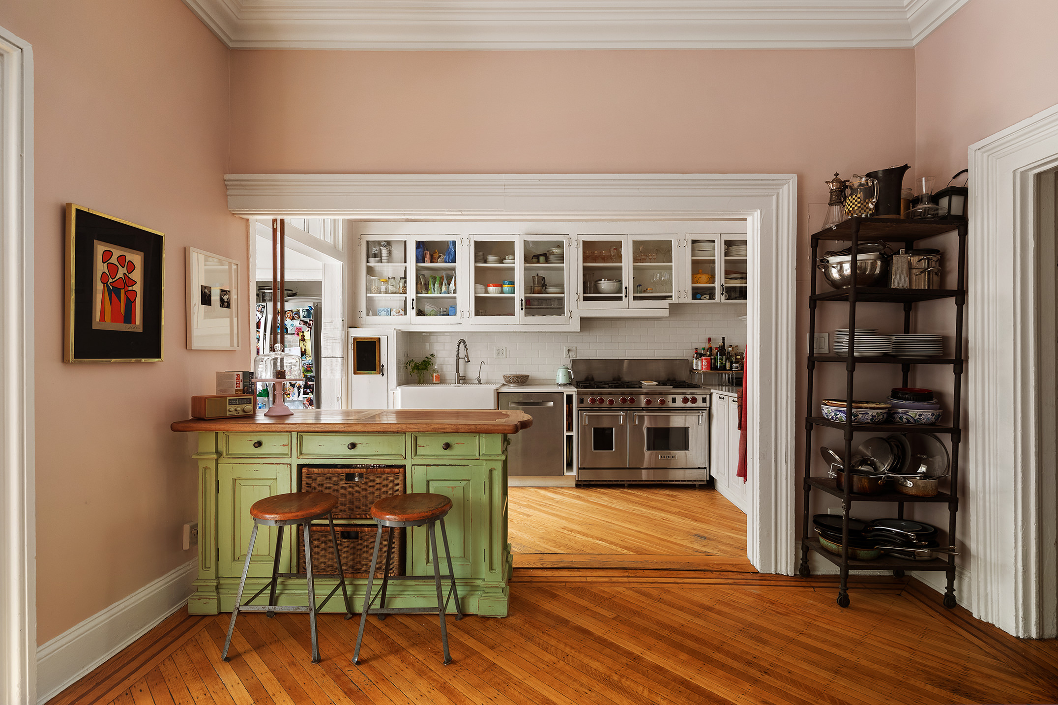 264 Clinton Avenue Brooklyn, NY 11205 - Photo 4 of 21 a dining room with a wooden table and chairs