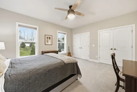 a view of a livingroom with furniture and kitchen