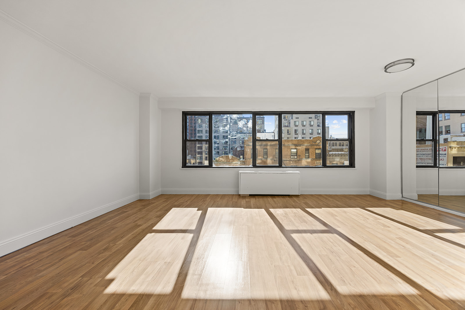 85 Livingston Street, Unit 6F Brooklyn, NY 11201 - Photo 2 of 11 view of an empty room with windows