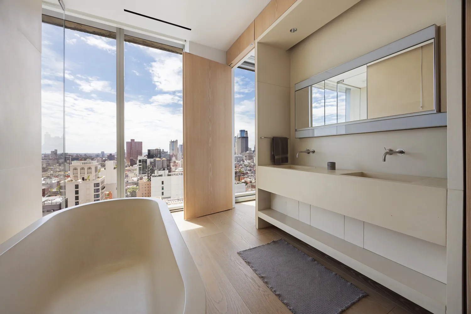 a bedroom with a bed and a night stand