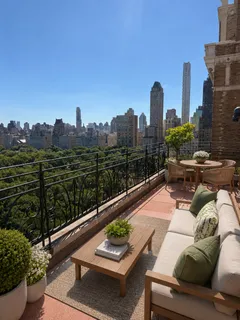 a view of a terrace with furniture