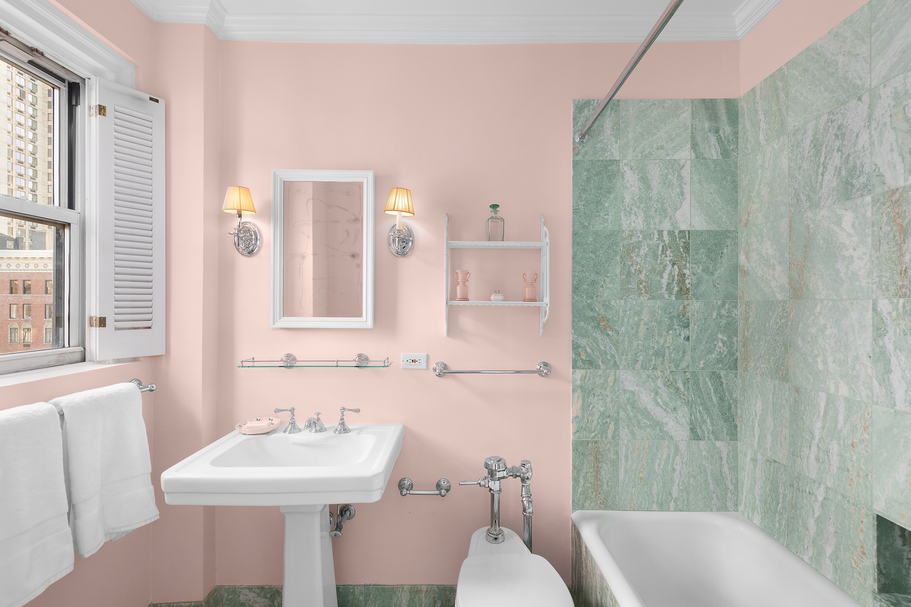 1088 Park Avenue, Unit 15C Manhattan, NY 10128 - Photo 11 of 26 a bathroom with a sink toilet and shower