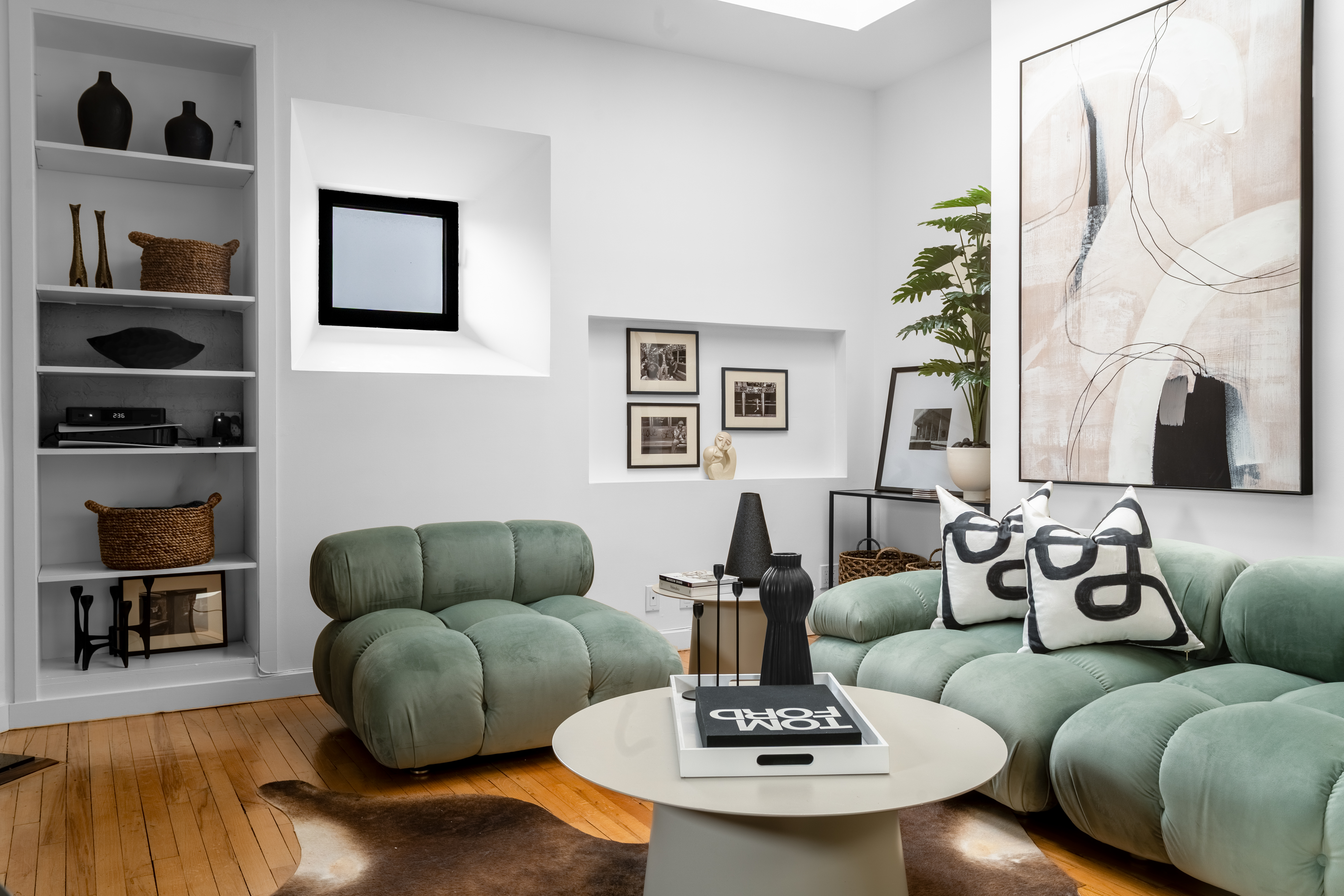 205 West 89th Street, Unit PH8 Manhattan, NY 10024 - Photo 5 of 15 a living room with furniture and a wooden floor